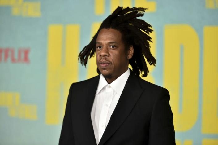 FILE - Jay-Z arrives at a special screening of &quot;The Harder They Fall&quot; at the Shrine, on Wednesday, Oct. 13, 2021, in Los Angeles. A fragrance company&#39;s lawsuit against rapper Jay-Z over breach of contract claims, and his subsequent countersuit against the company, were both rejected Wednesday, Nov. 10, with a jury finding that neither side had proven its claims and awarding no damages. (Photo by Richard Shotwell/Invision/AP, File)