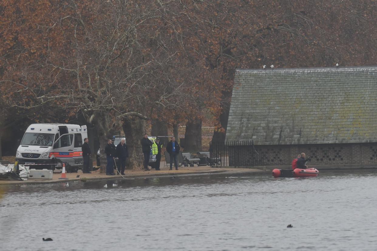 Police boat crews on the Serpentine after the discovery of the bomb: Jeremy Selwyn