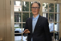 Boston Red Sox owner John Henry speaks with the news media after a meeting of Major League Baseball owners, Thursday, Feb. 9, 2023, in Palm Beach, Fla. (AP Photo/Lynne Sladky)