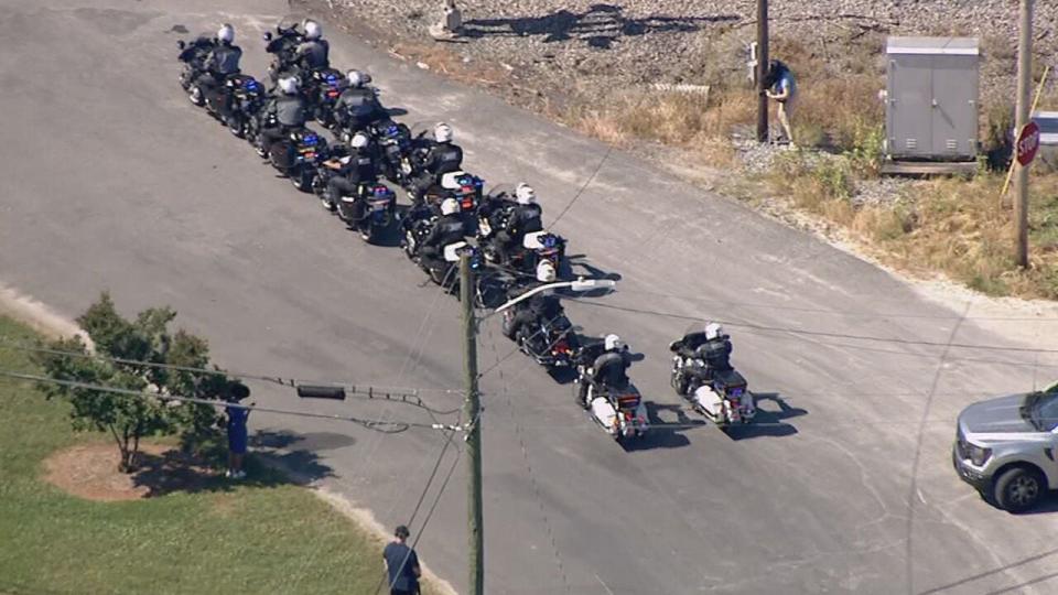 A procession was held for Alden Elliott, one of the four officers killed in the line of duty Monday. Agencies and individuals saluted the cars that would take Elliott to his funeral in Catawba.