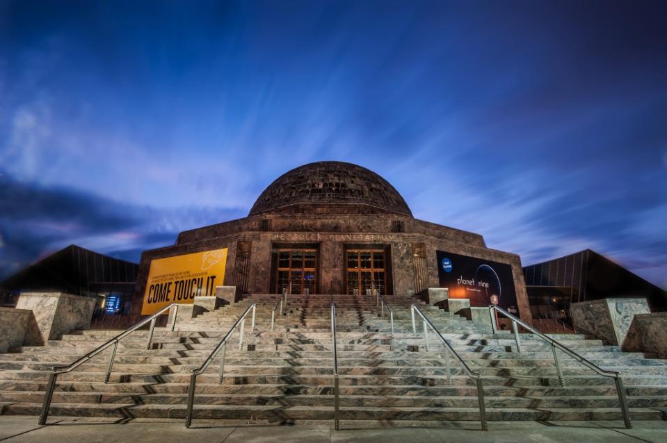 Sun rising behind the Adler Planetarium via Getty Images