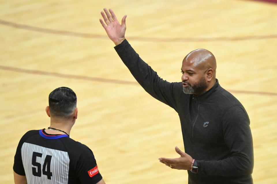 Cavaliers head coach J. B. Bickerstaff talks to referee Ray Acostain the fourth quarter against the Charlotte Hornets, March 25, 2024, in Cleveland.
