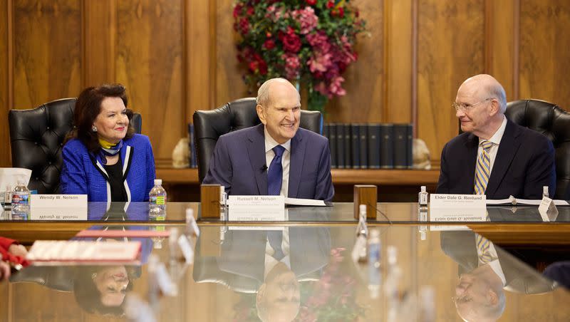 President Russell M. Nelson, center, presents his medical journals to the University of Utah while accompanied by his wife, Sister Wendy Nelson, left, and Elder Dale G. Renlund of the Quorum of the Twelve Apostles on Aug. 30, 2023, at the Church Administration Building in Salt Lake City.