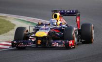 Red Bull Formula One driver Sebastian Vettel of Germany drives during the qualifying session of the Japanese F1 Grand Prix at the Suzuka circuit October 12, 2013. REUTERS/Issei Kato (JAPAN - Tags: SPORT MOTORSPORT F1)