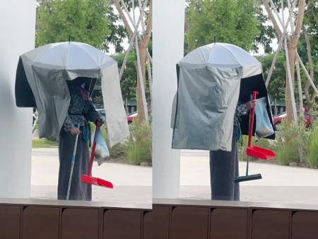 高雄內惟藝術中心的工作人員頭上戴著傘掃地。（翻攝自Threads）