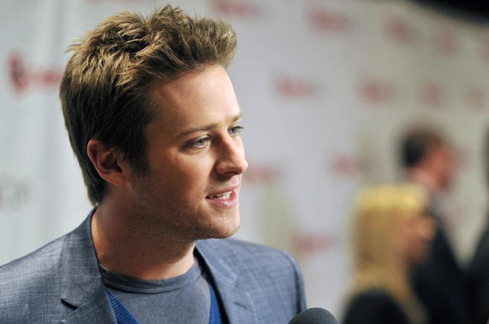 Armie Hammer, who stars in the title role in the upcoming film "The Lone Ranger," is interviewed backstage at the Walt Disney Studios presentation at CinemaCon 2013 at Caesars Palace on Wednesday, April 17, 2013 in Las Vegas. (Photo by Chris Pizzello/Invision/AP)