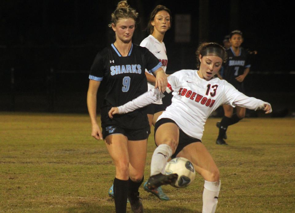 Ponte Vedra forward Jenny Dearie (9) and Edgewood midfielder Nina Lopez (13) challenge for possession in a high school girls soccer game on December 15, 2023. [Clayton Freeman/Florida Times-Union]