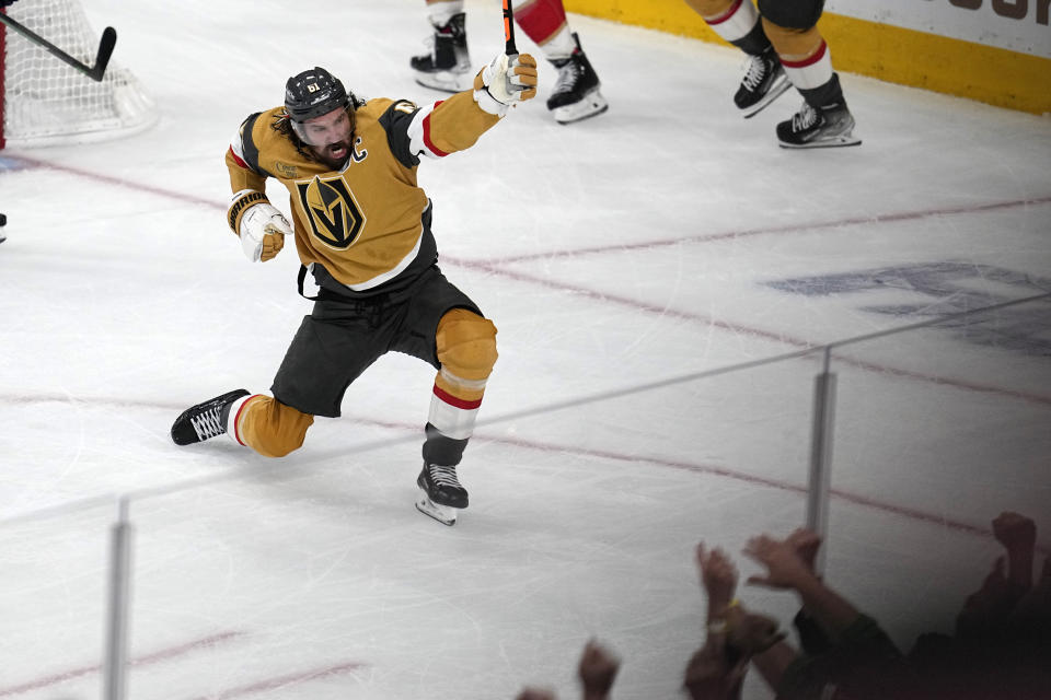 Vegas Golden Knights right wing Mark Stone, center, celebrates after scoring during the first period in Game 5 of the NHL hockey Stanley Cup Finals against the Florida Panthers Tuesday, June 13, 2023, in Las Vegas. (AP Photo/Abbie Parr)