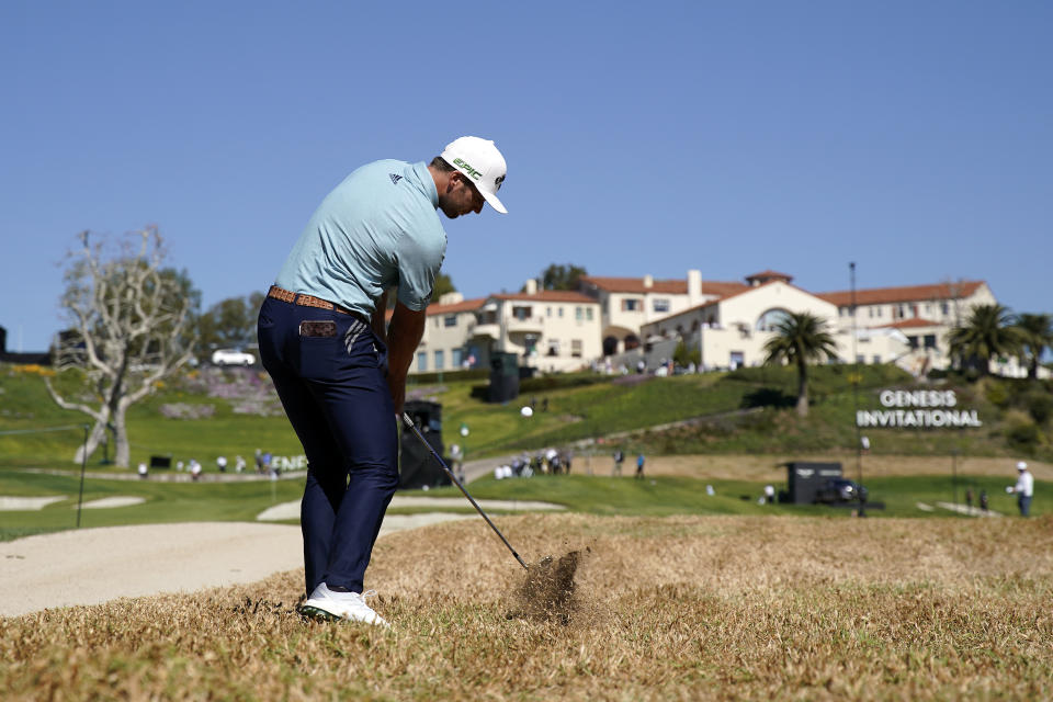 Sam Burns hits his second shot from the rough on the ninth hole during the second round of the Genesis Invitational golf tournament at Riviera Country Club, Friday, Feb. 19, 2021, in the Pacific Palisades area of Los Angeles. (AP Photo/Ryan Kang)