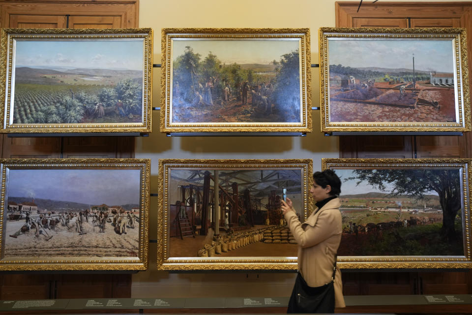 Paintings are displayed at the Paulista Museum, known by Brazilians as the Ipiranga Museum in Sao Paulo, Brazil, Thursday, Sept. 1, 2022. After nearly a decade of renovations, the museum founded in 1895 by a creek where emperor Pedro I declared the nation's independence from Portugal is reopening as part of the country's bicentennial celebrations. (AP Photo/Andre Penner)