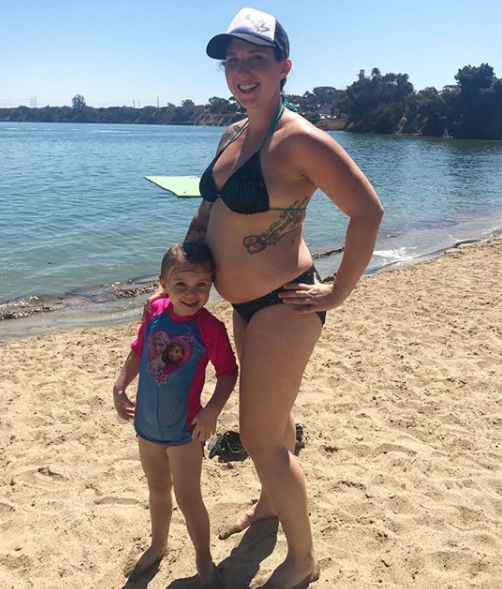 Sarah says powerlifting is helping prepare her body for labour. Photo: Instagram