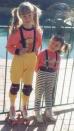 “This is my and my little sister in the late 80s. We thought we looked so cool with our bracers and I was in love with my pink and white roller skates. Note the mandatory jumpers tucked in to pants look.”