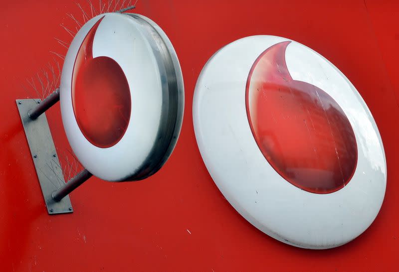 FILE PHOTO: Vodafone branding is seen outside a retail store in London