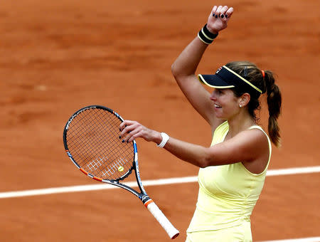 Julia Goerges of Germany celebrates after defeating Caroline Wozniacki of Denmark during their women's singles match at the French Open tennis tournament at the Roland Garros stadium in Paris, France, May 28, 2015. REUTERS/Vincent Kessler