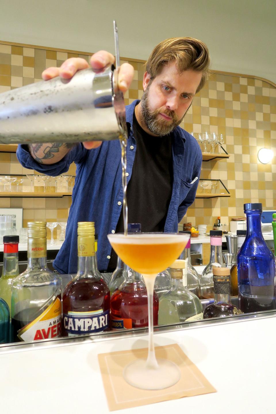 Ricardo Rodriguez pours an El Primo at La Otra cocktail bar inside Lita in Aberdeen.