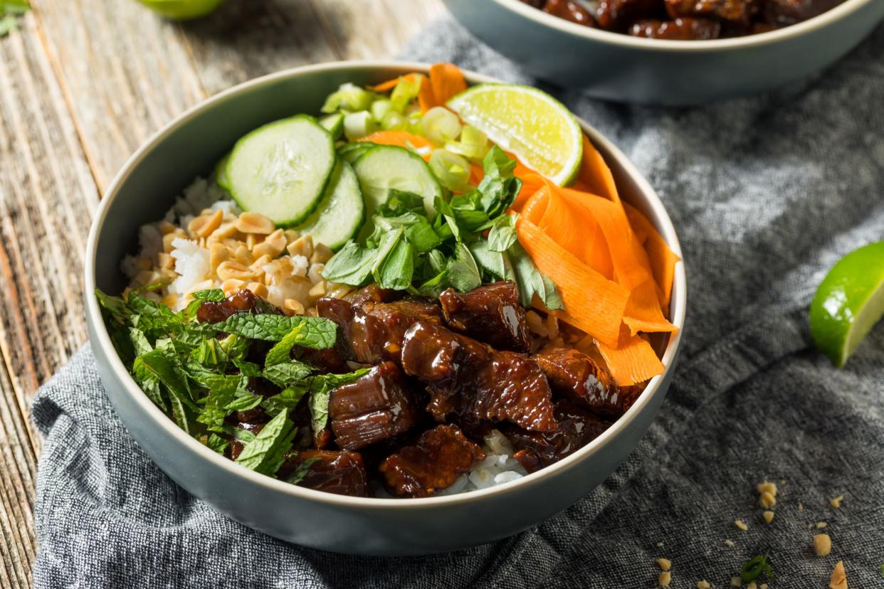 Homemade Thai Beef and Rice Bowl with Veggies Herbs