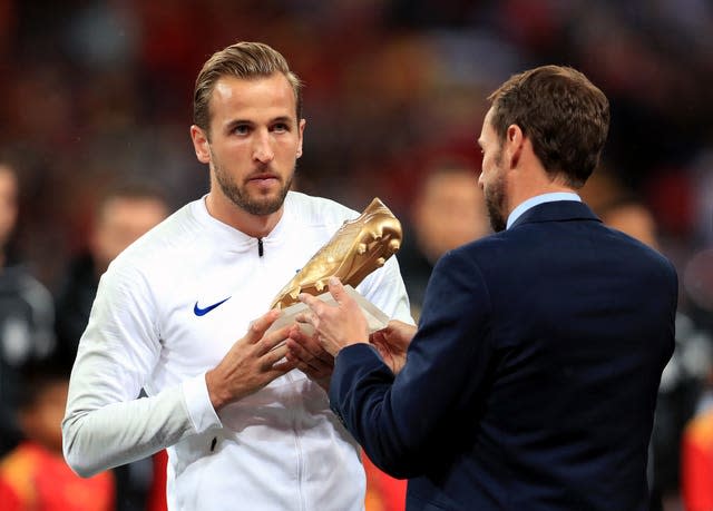 England manager Gareth Southgate (right) presents Harry Kane (left) with the Golden Boot after his goalscoring feat in Russia