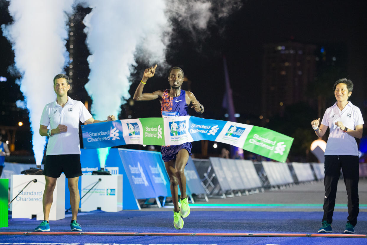 Kenya's Joshua Kipkorir retains the Standard Chartered Singapore Marathon men's elite title, clocking 2hr 19min 13sec. (PHOTO: Standard Chartered Singapore Marathon) 