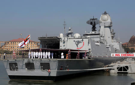 FILE PHOTO: Indian Navy officers hoist the ensign aboard the INS Chennai, India's third indigenously designed guided missile destroyer, during its commissioning ceremony in Mumbai, India, November 21, 2016. REUTERS/Shailesh Andrade/File Photo