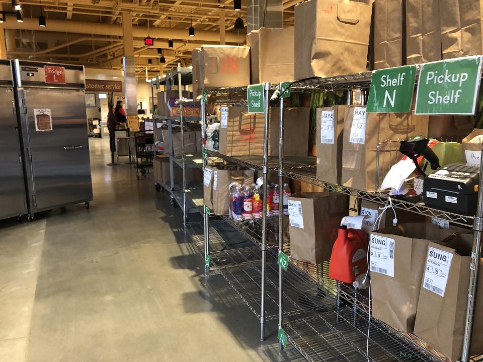 Wegmans grocery store, Instacart Pick up area with shelves and refrigerators, Boston, Massachusetts. (Photo by: Lindsey Nicholson/UCG/Universal Images Group via Getty Images)