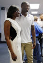 Kentucky's Julius Randle, right, poses with his mother Carolyn Kyles after Randle announced he will enter his name in the NBA draft during a news conference in Lexington, Ky., Tuesday, April 22, 2014. (AP Photo/James Crisp)