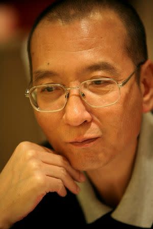 FILE PHOTO: Chinese dissident Liu Xiaobo is seen in this undated photo released by his families. Handout via REUTERS/File Photo