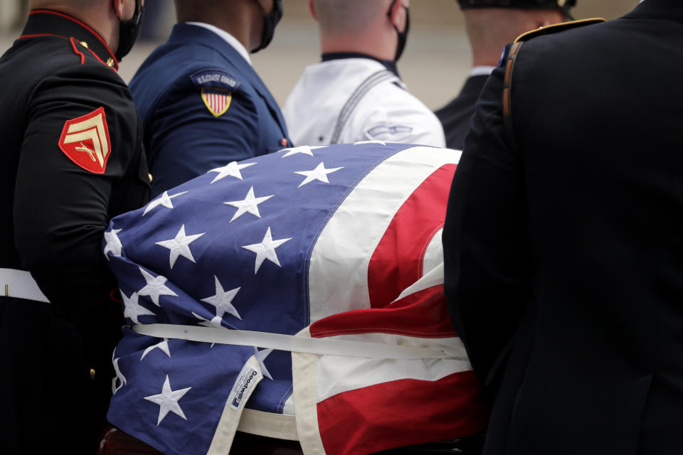 The casket of Rep. John Lewis is carried into the capital as Lewis will lie in repose, Wednesday, July 29, 2020, in Atlanta. Lewis, who carried the struggle against racial discrimination from Southern battlegrounds of the 1960s to the halls of Congress, died Friday, July 17, 2020. (AP Photo/Brynn Anderson)