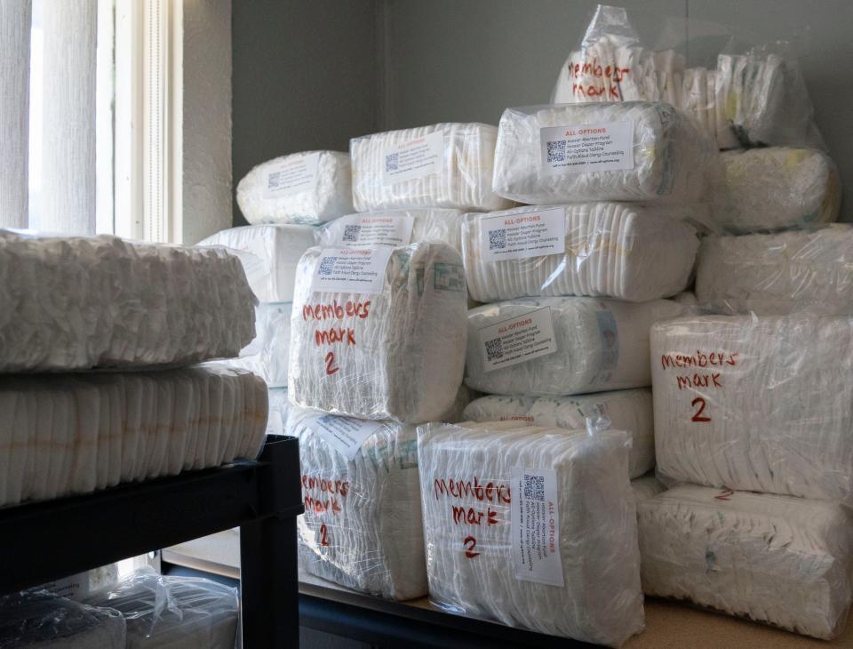 A stack of diapers sits on a shelf Monday, Oct. 3, 2022, at the All-Options Hoosier Diaper Program in Bloomington. The Diapers are all donated or bought by the program with donation and grant money.