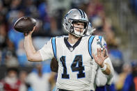 FILE - Carolina Panthers quarterback Sam Darnold (14) prepares to pass during an NFL preseason football game against the Buffalo Bills on Friday, Aug. 26, 2022, in Charlotte, N.C. Darnold will make his first start of the season for the Carolina Panthers on Sunday, Nov. 27, against the Denver Broncos. (AP Photo/Rusty Jones, File)