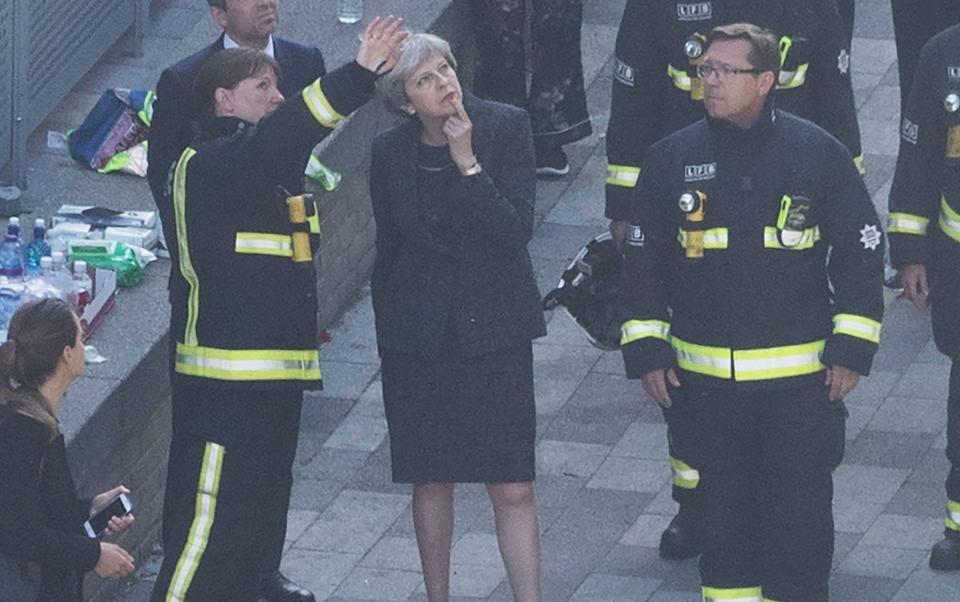 Mrs May was criticised for meeting members of the London Fire Brigade before residents affected by the Grenfell fire - Credit: i-Images