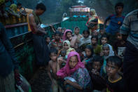 <p>New arrivals rest after a long truck ride from the border without any knowledge of where to go next on October 5, 2017, in Kutupalong, Cox’s Bazar, Bangladesh. (Photograph by Paula Bronstein/Getty Images) </p>