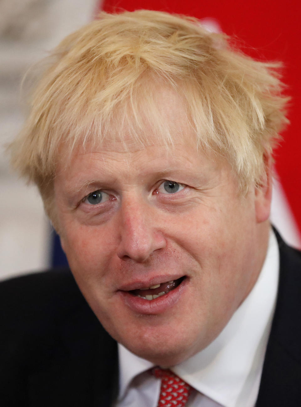 Britain's Prime Minister Boris Johnson sits down to welcome the Emir of Qatar, Sheikh Tamim bin Hamad Al Thani at 10 Downing Street in London, Friday, Sept. 20, 2019 for bilateral talks. (AP Photo/Frank Augstein, pool)