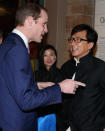 Prince William, Duke of Cambridge meets actor Jackie Chan as he arrives at an evening reception for the Illegal Wildlife Trade conference at Natural History Museum in London, Wednesday, Feb. 12, 2014. (AP Photo/Chris Jackson, Pool)