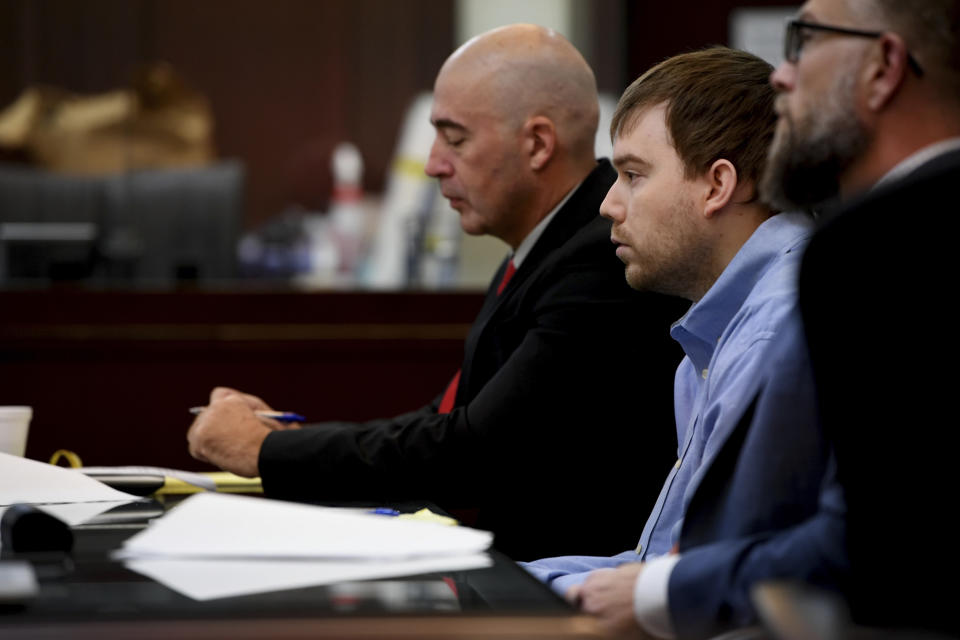 Travis Reinking listens during the victim impact statements at Justice A.A. Birch Building in Nashville, Tenn., on Saturday, Feb. 5, 2022. Jurors are hearing testimony about whether or not to make parole possible after 51 years in prison for Reinking, the man who shot and killed four people at a Nashville Waffle House in 2018. Jurors on Friday rejected Reinking’s insanity defense as they found him guilty on 16 charges, including four counts of first-degree murder. (Nicole Hester/The Tennessean via AP, Pool)