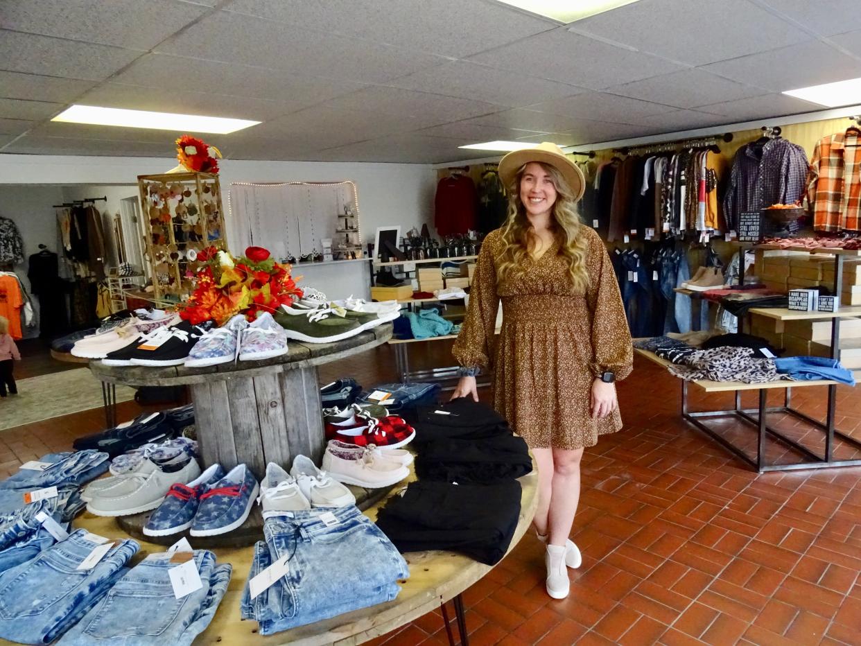 Allison Pollock stands in her store Beautiful Crazy Boutique at 108 Taylor St. in Zanesville.