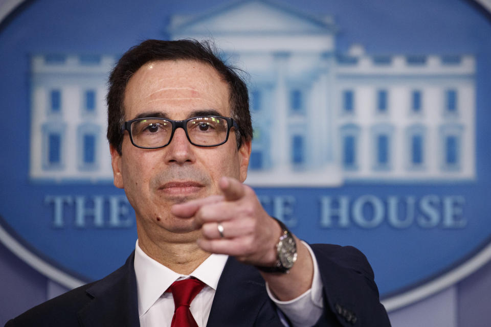 Treasury Secretary Steve Mnuchin takes questions as he speaks during a news briefing at the White House, in Washington, Monday, July 15, 2019. (AP Photo/Carolyn Kaster)