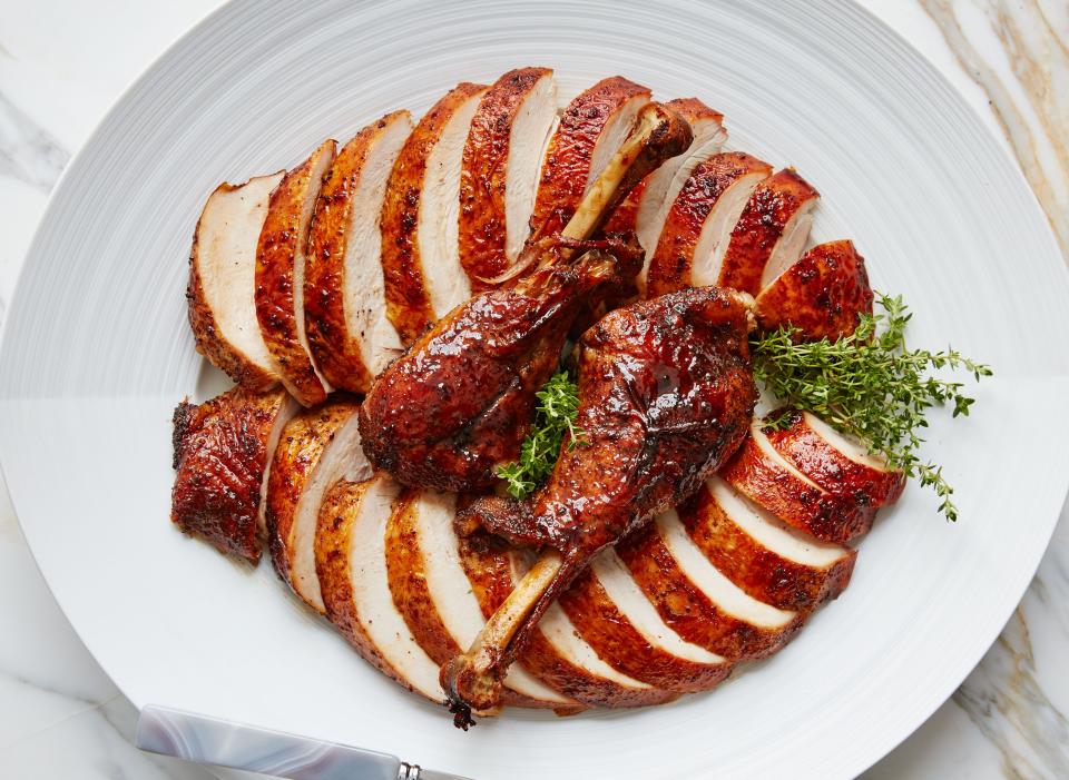 Separate cooking techniques for breast and legs in this recipe ensure that the different cuts reach their most delicious potential. Cutting the raw turkey into parts is the only challenge here; if possible, ask your butcher to do it for you. <a href="https://www.bonappetit.com/recipe/bourbon-and-brown-sugar-glazed-turkey?mbid=synd_yahoo_rss" rel="nofollow noopener" target="_blank" data-ylk="slk:See recipe.;elm:context_link;itc:0;sec:content-canvas" class="link ">See recipe.</a>