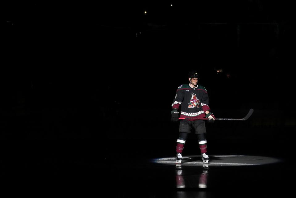 Oct 28, 2022; Tempe, AZ, USA; Phoenix Coyotes defender 	Shayne Gostisbehere (14) is introduced before they take on the Winnipeg Jets at Mullett Arena. Mandatory Credit: Joe Rondone-Arizona Republic