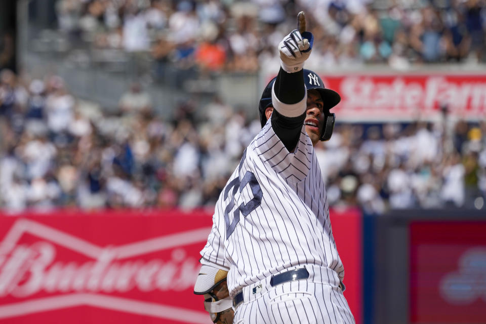 New York Yankees' Gleyber Torres gestures to the fans after hitting a solo home run in the eighth inning of a baseball game against the Houston Astros, Saturday, Aug. 5, 2023, in New York. (AP Photo/Mary Altaffer)