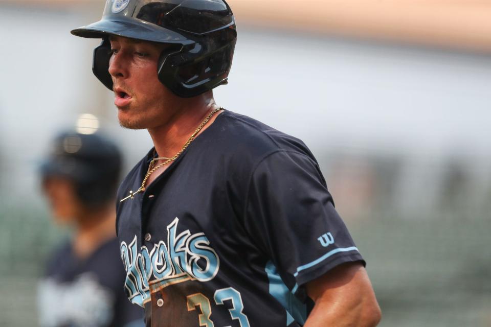 Hooks' Zach Dezenzo scores during a homestand against the Sod Poodles at Whataburger Field on Thursday, June 22, 2023.