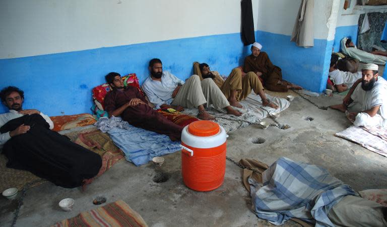 Drug addicts at a centre run by local cleric Mullah Ilyas Qadri in Haripur on on July 19, 2014