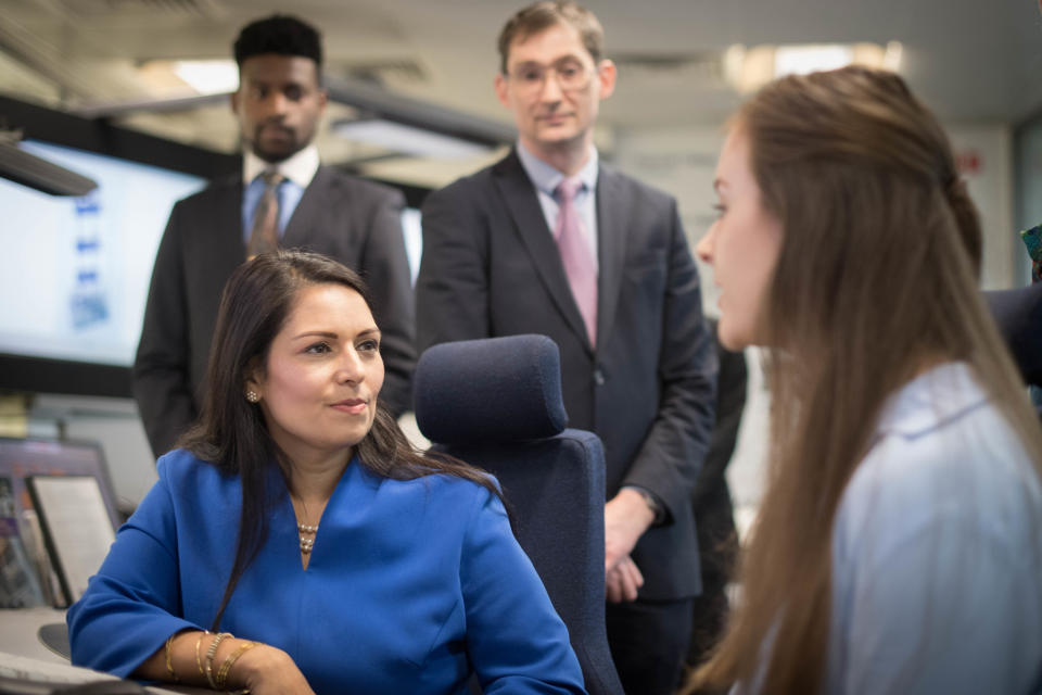 Home Secretary Priti Patel with students and staff at Imperial College London (Stefan Rousseau/PA)