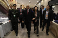 Singapore's Defense Minister Ng Eng Hen arrives for the 10th Beijing Xiangshan Forum in Beijing, Tuesday, Oct. 31, 2023. Ng called on China, as a dominant power in Asia, to take the lead in reducing tensions by being a benevolent one, warning that military conflict like the wars in Ukraine and Gaza would be devastating to the region's future. (AP Photo/Ng Han Guan)