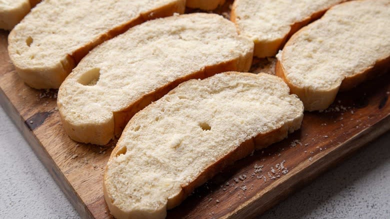 bread slices with parmesan on top