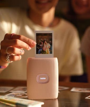 Use this portable printer to turn photos on your phone into instax mini prints