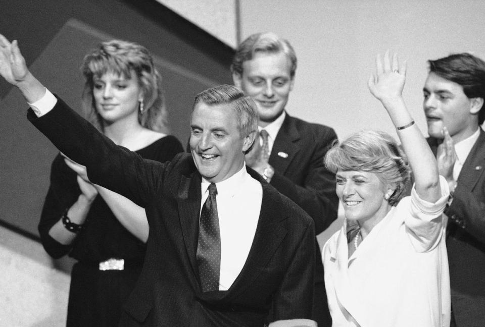 Democratic presidential nominee Walter Mondale and his running mate Geraldine Ferraro wave from the podium at the conclusion of the 1984 Democratic National Convention in San Francisco.