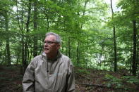 Ed Evans, Democratic West Virginia delegate and retired public school teacher, speaks about the more than 80 coal miners killed in the 1912 Jed Coal and Coke Company explosion during a visit to the unmarked gravesite where disaster victims are buried in Havaco, W.Va, on June 7, 2022. (AP Photo/Leah Willingham)