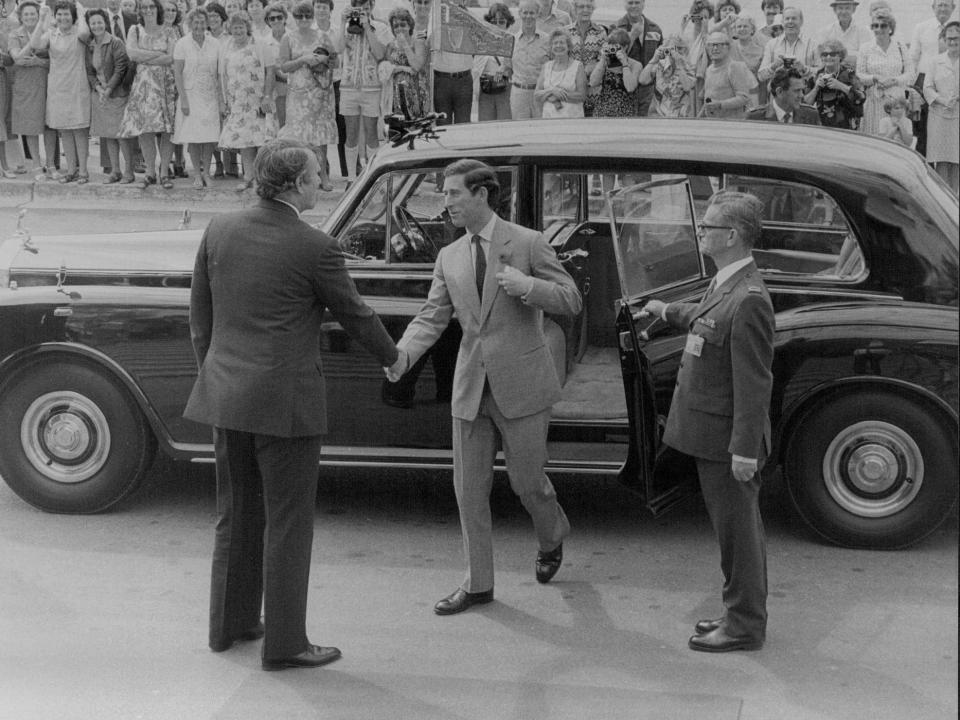 Prince Charles greets the Australian Prime Minister Malcolm Fraser in March 1979.