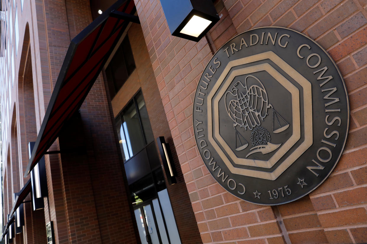 Signage is seen outside of the US Commodity Futures Trading Commission (CFTC) in Washington, D.C., U.S., August 30, 2020. REUTERS/Andrew Kelly