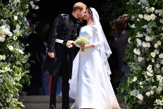 <p>Ben STANSALL - WPA Pool/Getty</p> Prince Harry and Meghan Markle at their royal wedding on May 19, 2018